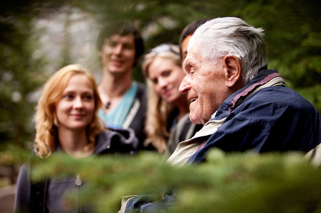 Elderly man with his family