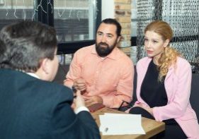 Couple sitting in divorce mediation